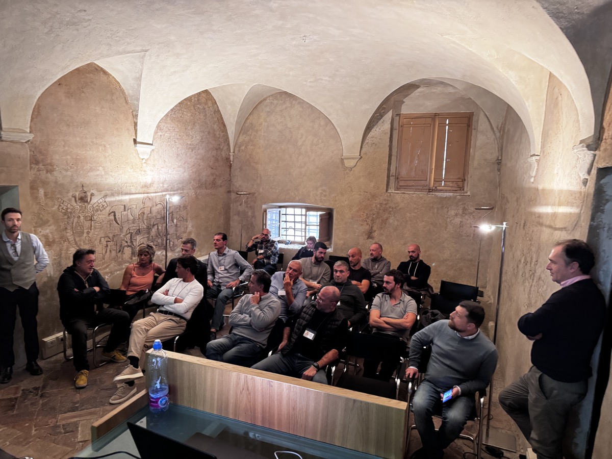 Partecipanti seduti durante le presentazioni del workshop